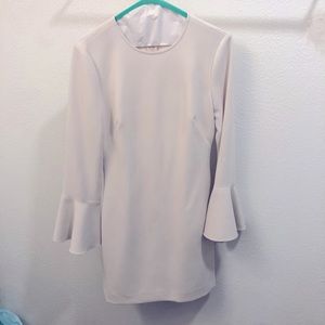 Ivory, fitted, long sleeve dress with bell sleeves.